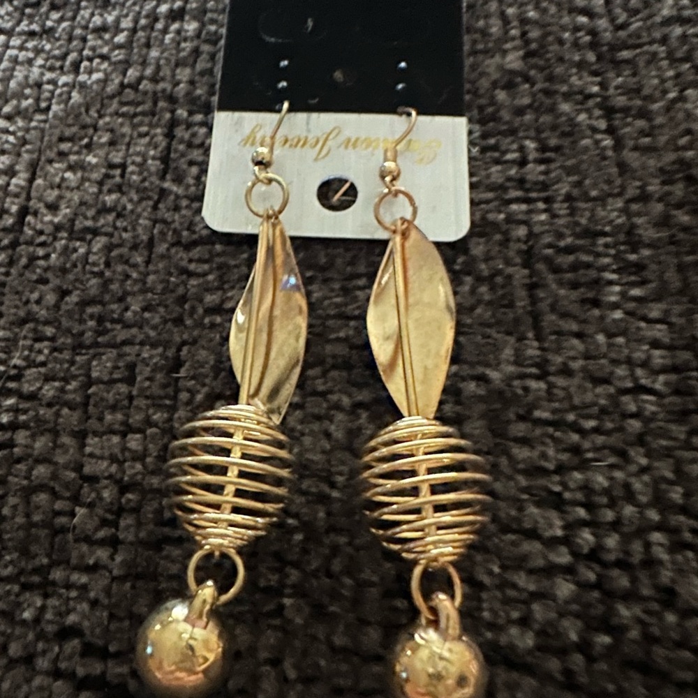 Lot of costume jewelry.  Some are tarnishing but can be polished.  Not real gold